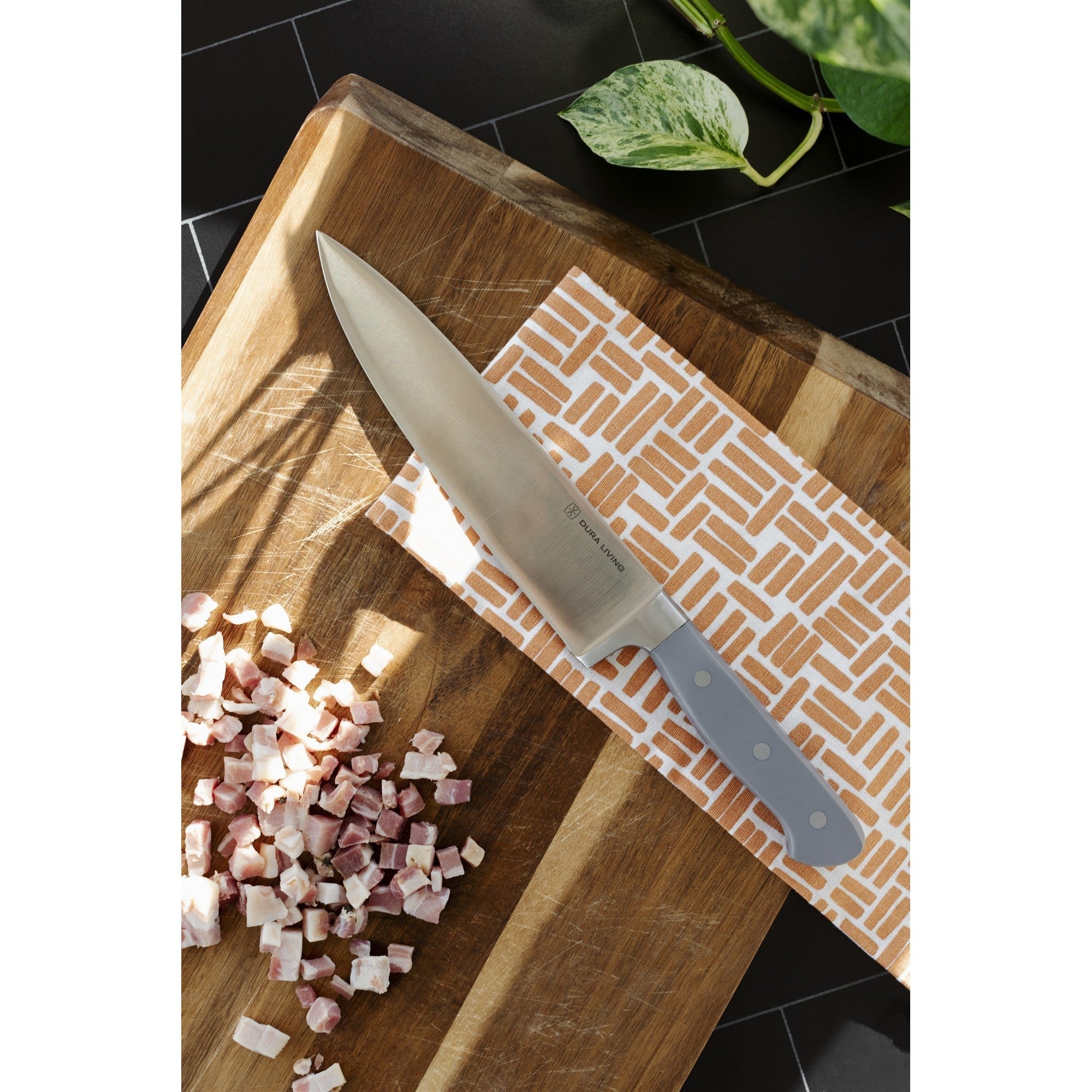 Superior 8-inch chef knife with gray ergonomic handle and high-carbon German steel blade. — view 4
