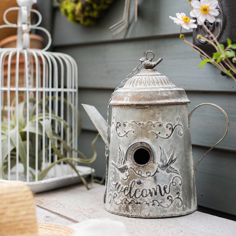 European iron flower pot birdcage decorative ornament on a living room shelf — view 2