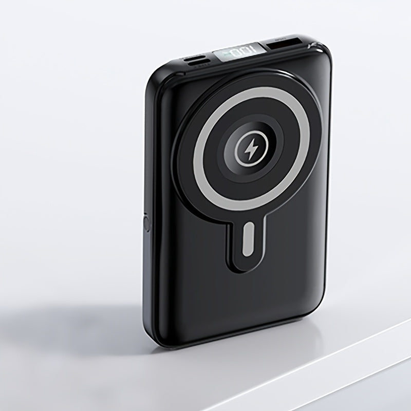 Black 3-in-1 magnetic wireless power bank with built-in stand and digital display for smartphones. — view 3