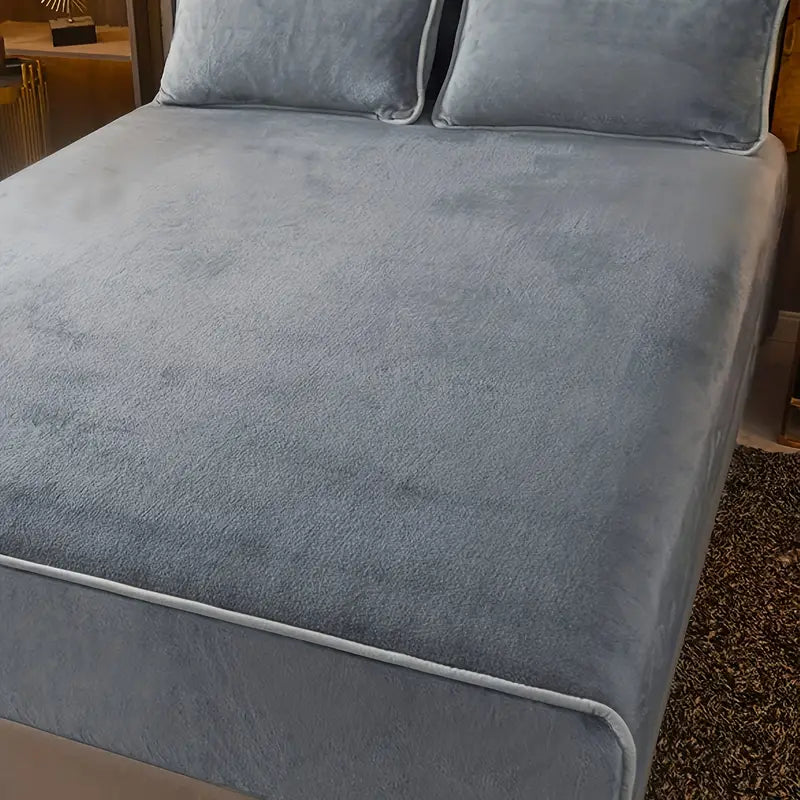 Solid grey milk fleece queen fitted sheet tightly secured on a mattress for comfortable sleeping — view 5