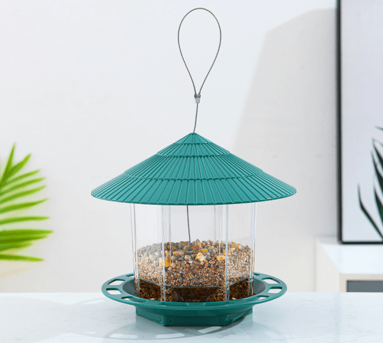 Transparent green plastic hanging bird feeder with automatic seed dispenser for outdoor garden spaces — view 2