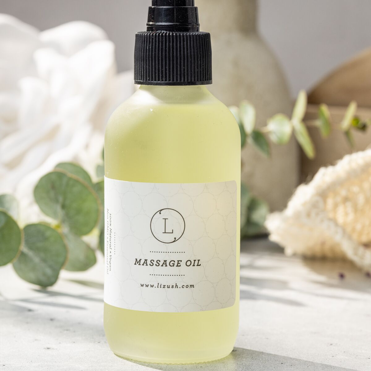 Eucalyptus massage oil in a 4 oz frosted glass spray bottle with cotton storage bag — view 2