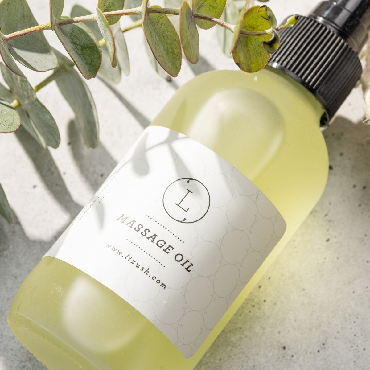 Eucalyptus massage oil in a 4 oz frosted glass spray bottle with cotton storage bag — view 3