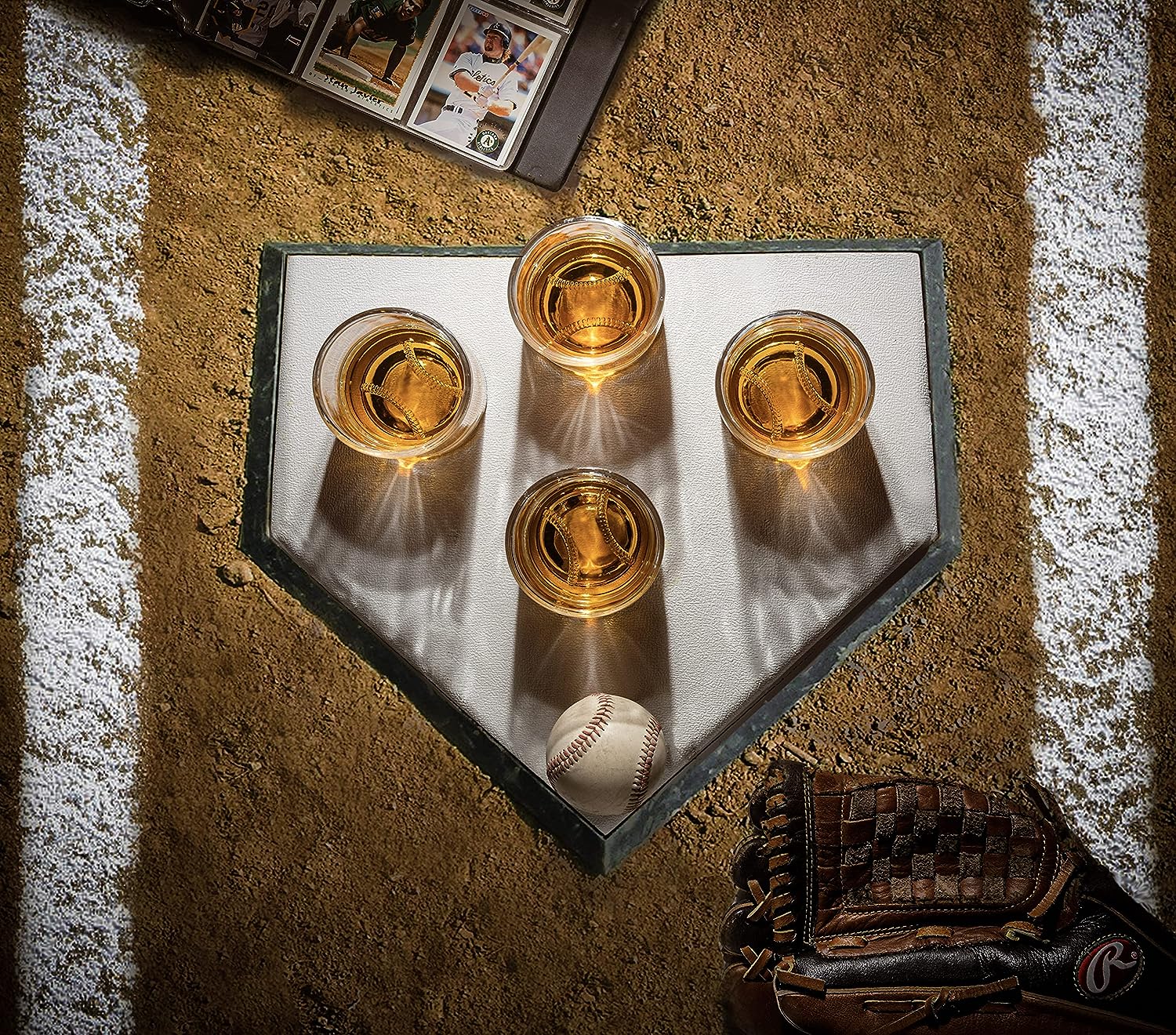 Clear 12oz baseball whiskey glass with a sculpted floating baseball design in the bottom base — view 4