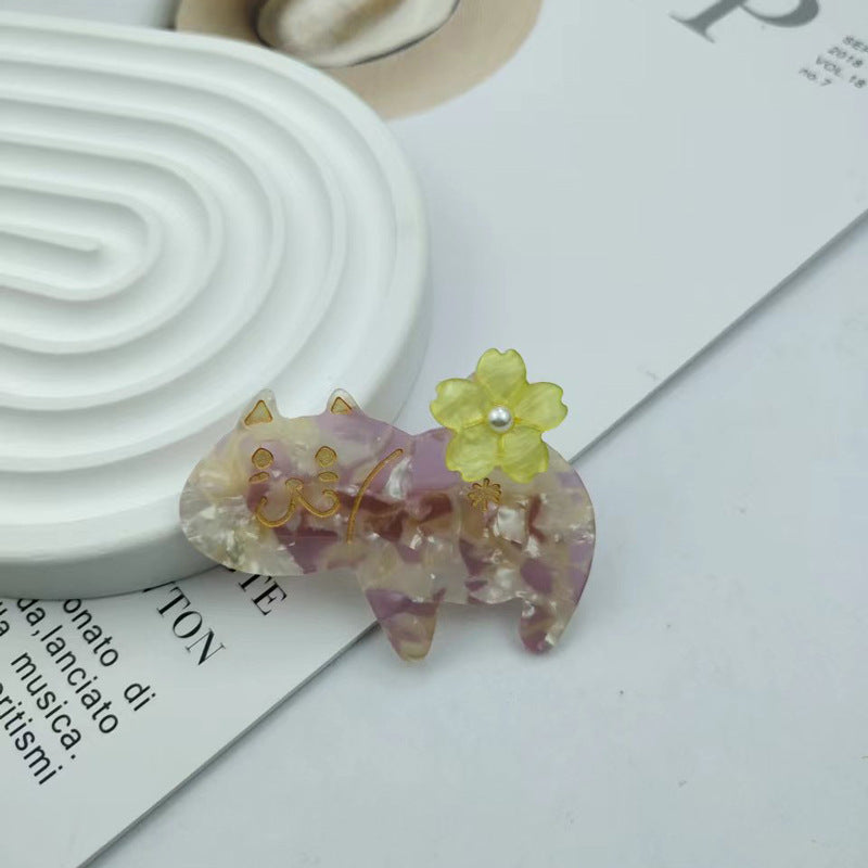 Hand-painted floral cat hair clip in eco-friendly cellulose acetate with glass rhinestones and alligator grip — view 5