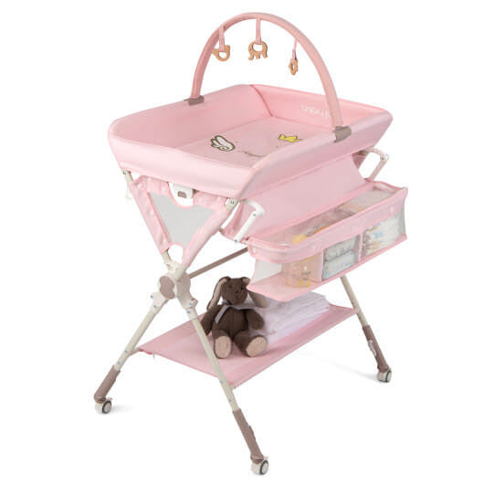Black foldable baby changing table station with storage bag, bottom shelf, and wheels. — view 7