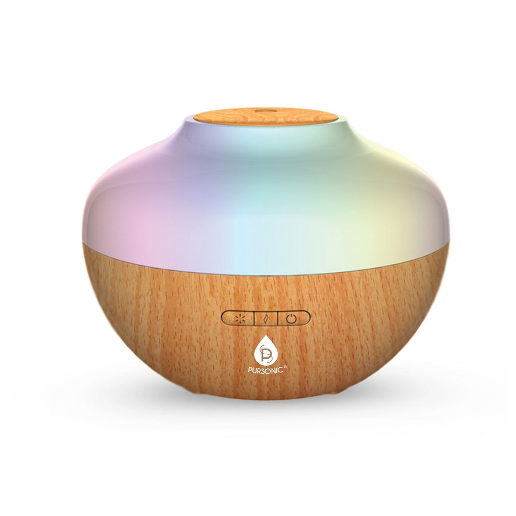 Aromatherapy diffuser and essential oil set with three bottles of oils and an illuminated mist — view 2