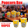 Vibrant yellow party popcorn boxes with black and white cartoon graphics for mess-free snacking