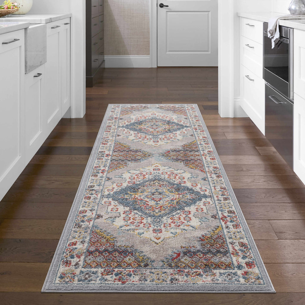 Haymond area rug featuring a traditional multi-color medallion pattern in taupe, blue, and red. — view 4