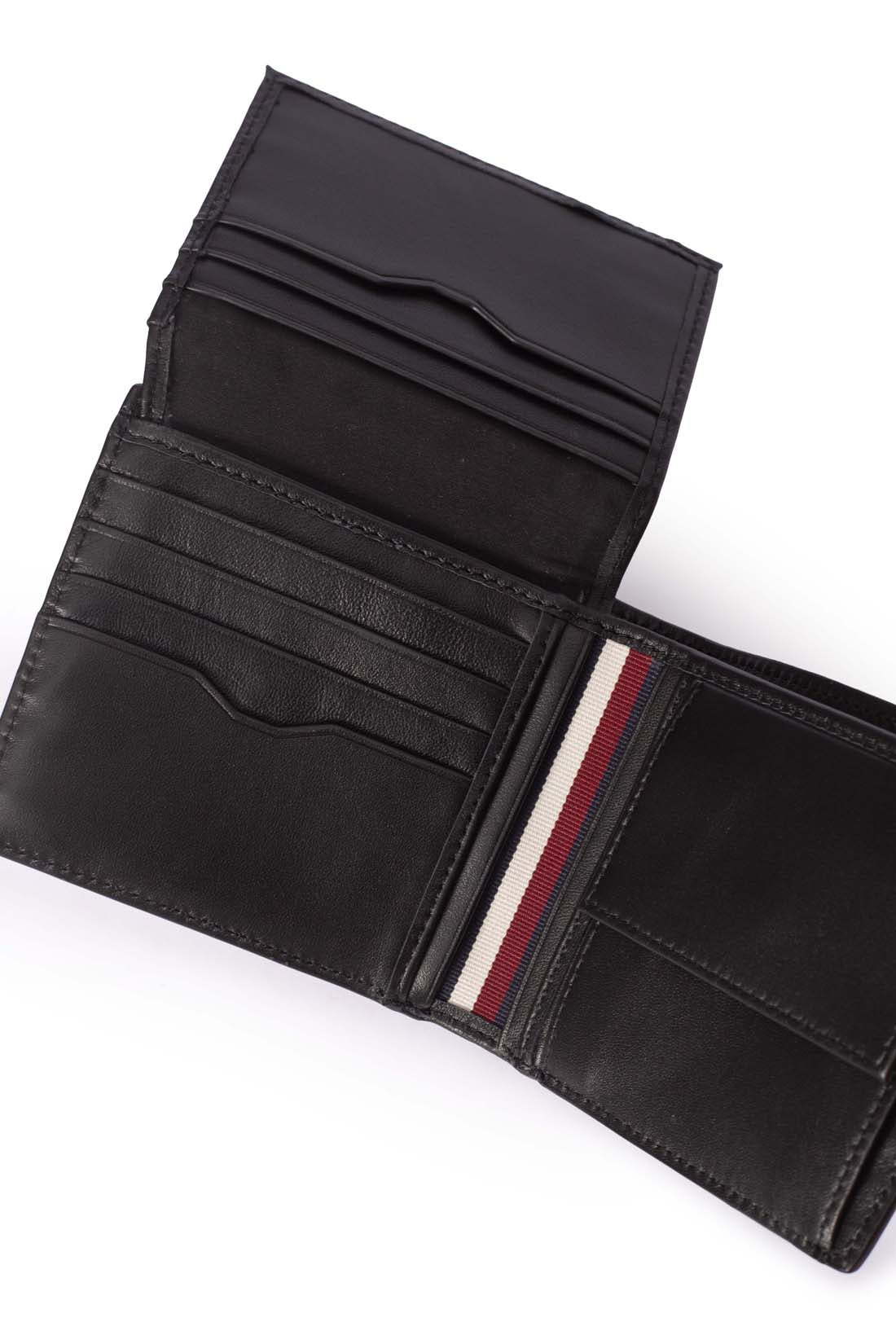 Men's black leather trifold wallet with knurled finish, card slots, and embossed logo detail — view 2