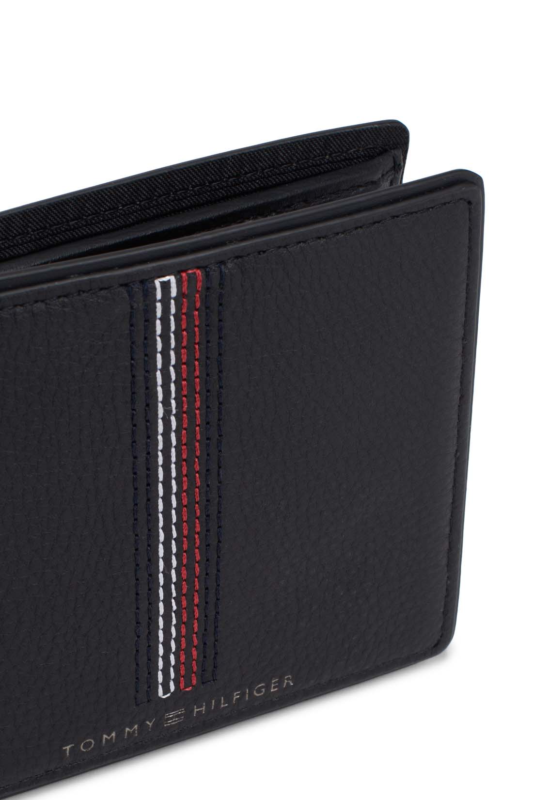 Men's navy blue hammered leather bifold wallet with iconic stitching and front logo
