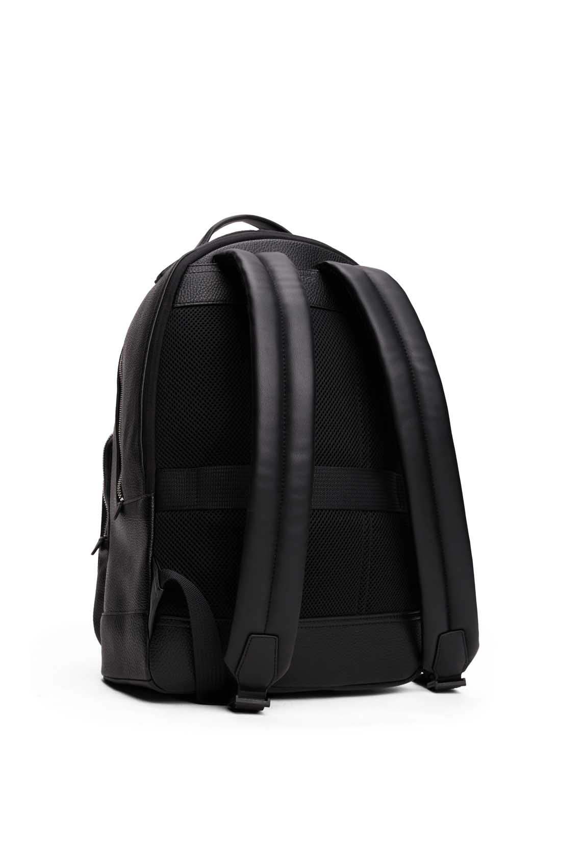 Men's black grained faux-leather backpack with double zip, front pockets, and metal logo detailing — view 3