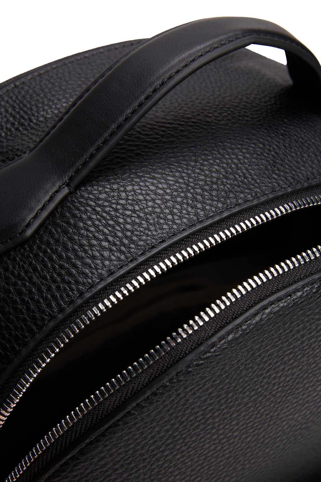 Men's black grained faux-leather backpack with double zip, front pockets, and metal logo detailing — view 6