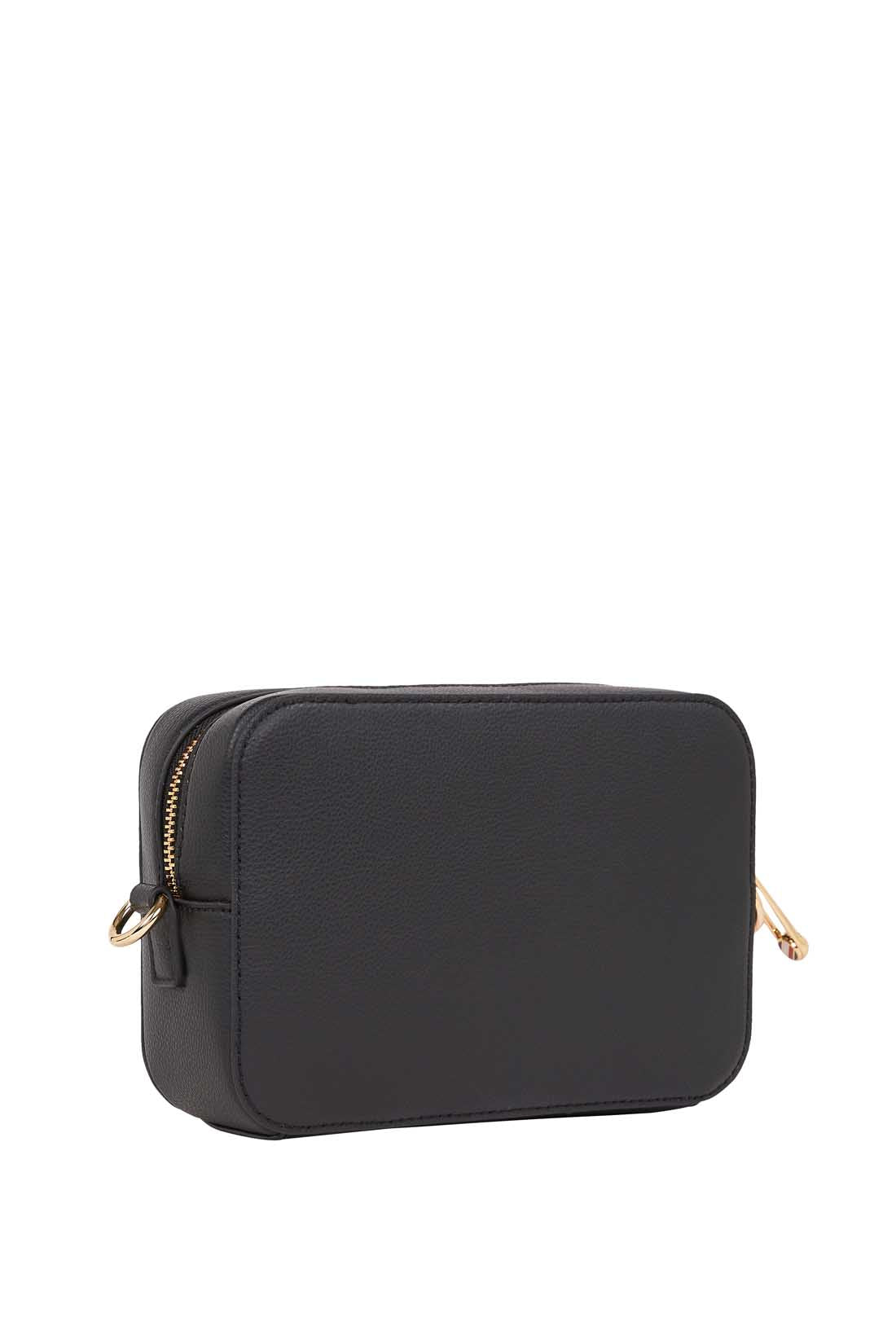 Women's black faux-leather crossbody shoulder bag with adjustable logo strap and front monogram plaque — view 3