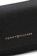 Black faux-leather women's wallet with embossed logo, front flap, and multiple compartments.