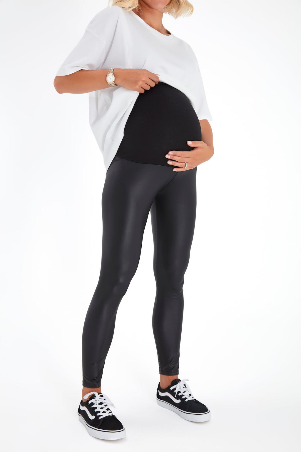 Black faux leather maternity leggings featuring a comfortable foldover cotton waistband — view 3
