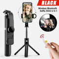 Wireless Bluetooth selfie stick tripod fully extended with smartphone mount and remote control attached