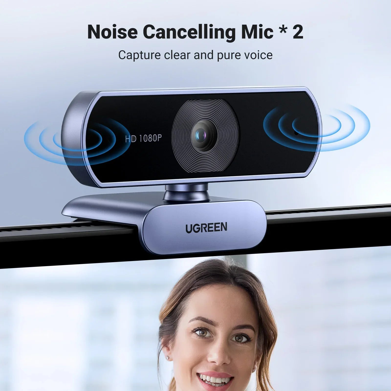 Black 1080P HD USB webcam with dual microphones clipped onto a computer monitor. — view 5