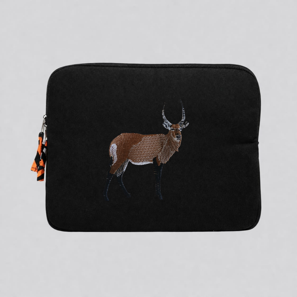 Handmade Kenyan cotton canvas laptop sleeve featuring embroidered African wildlife design in warm earthy tones — view 5