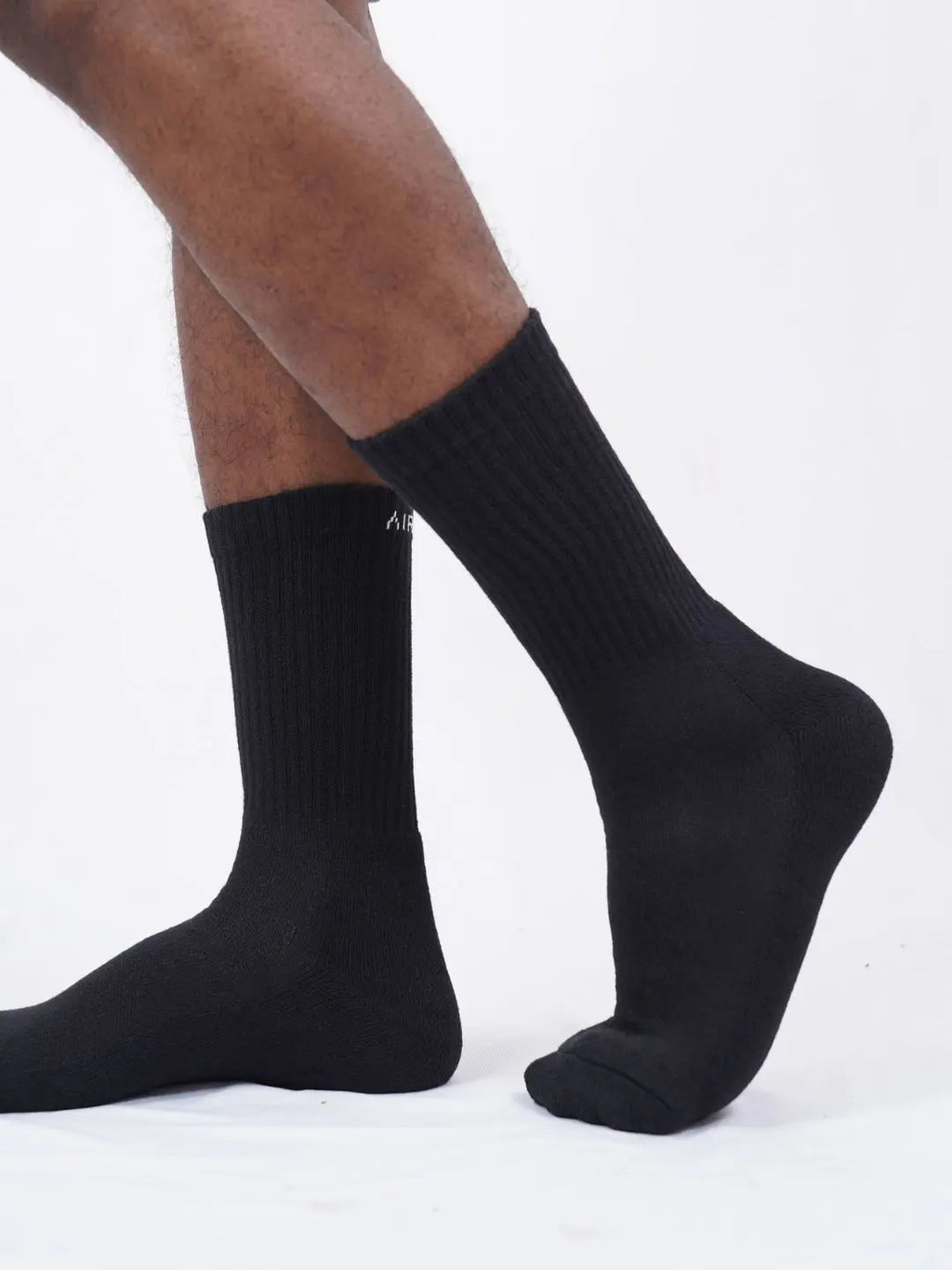 Three pairs of black premium cotton blend crew socks featuring soft cushioning and arch support. — view 5
