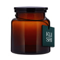 Amber glass apothecary storage jars with wide mouth for organizing bathroom essentials on a vanity