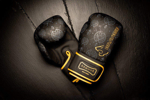 Armour 2.0 Boxing Gloves in matte black PU leather with gold trim and velcro strap — view 6
