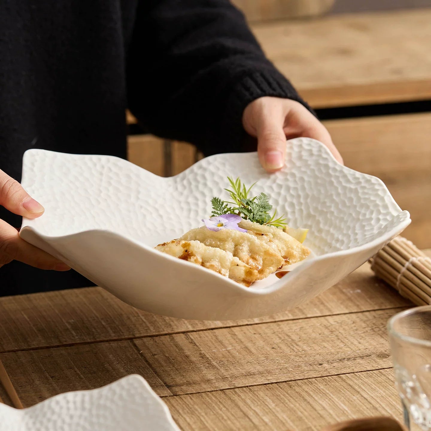 Irregular matte square plate in off white high fired ceramic with lattice surface — view 4
