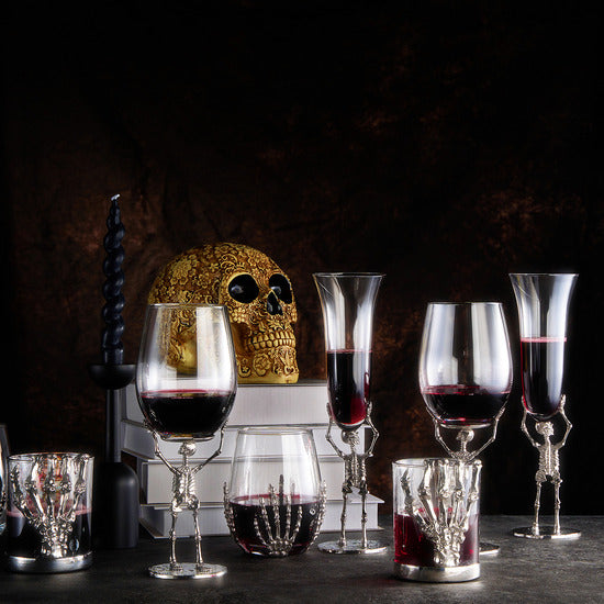 Skeleton stemmed wine glasses featuring silver finish bone stems and clear glass bowls — view 4
