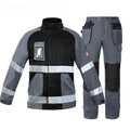 Bauskydd 100% cotton safety workwear uniform set for electricians and technicians in a workshop setting