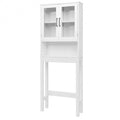 White over the toilet storage cabinet featuring tempered glass doors open shelving and metallic handles