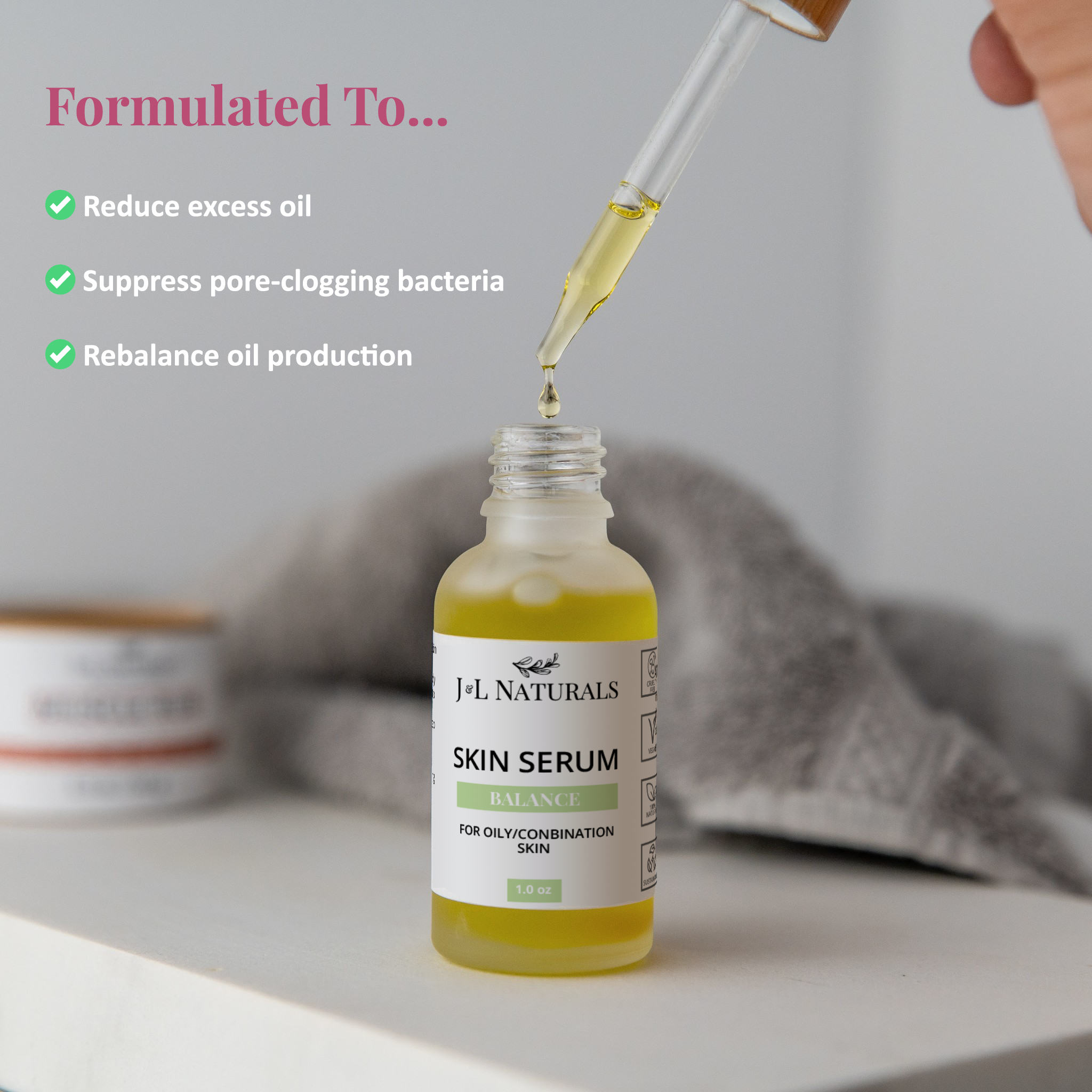 Natural plant-based face and body oil skin serum in a 1 oz glass dropper bottle — view 3