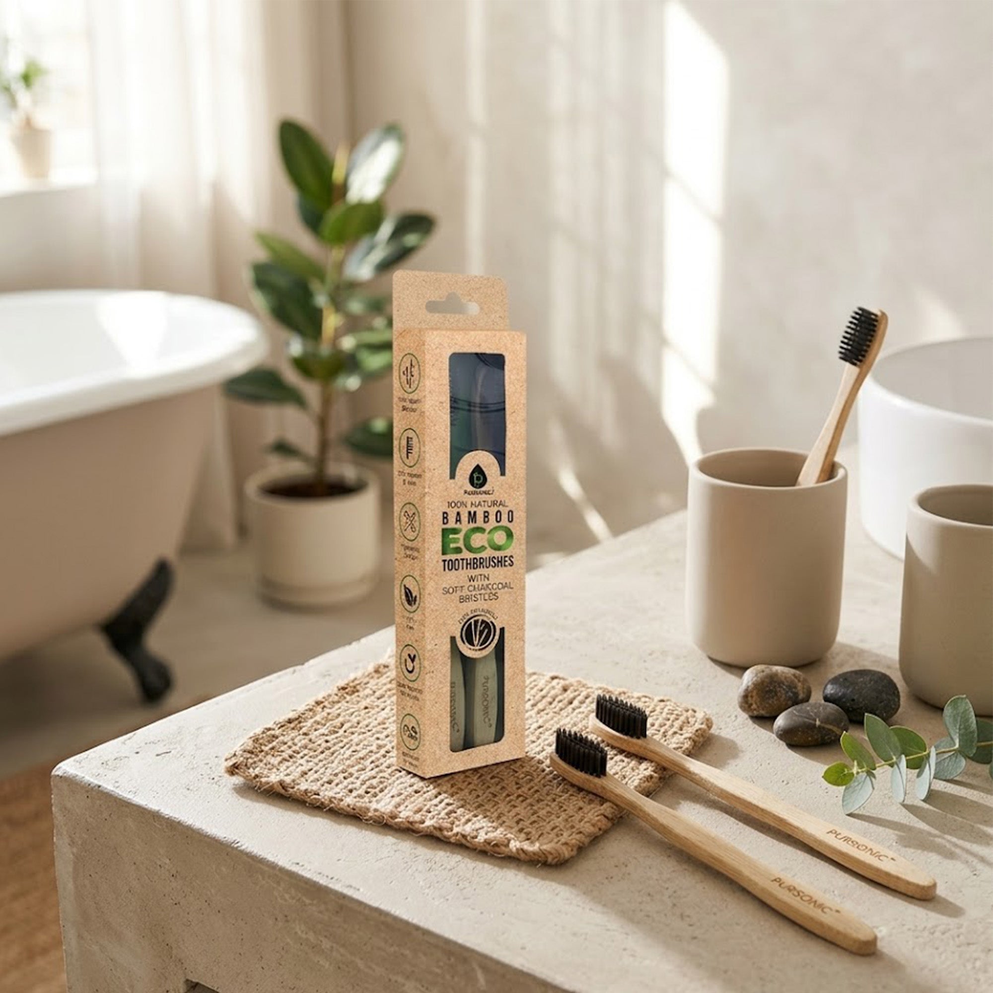 Two natural bamboo toothbrushes with bristles, packaged in sustainable recycled materials for daily oral care — view 3