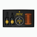 Four piece beard care grooming kit with styling comb, bottled oil, serum, and balm tin