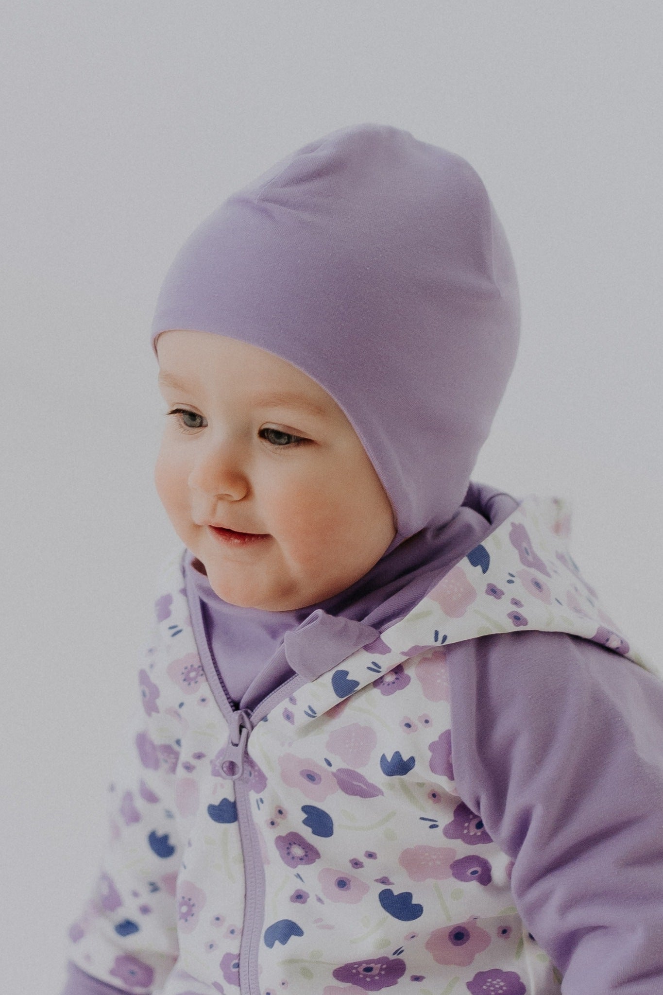 Spring-fall baby hat in double cotton with ear protection flaps and secure chin tie strings
