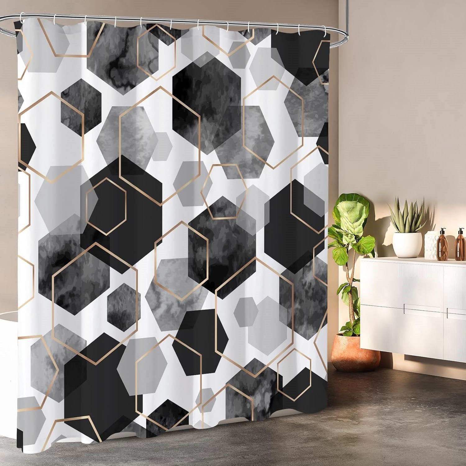 Black and white hexagonal pattern polyester shower curtain with metal grommets and plastic hanging hooks.