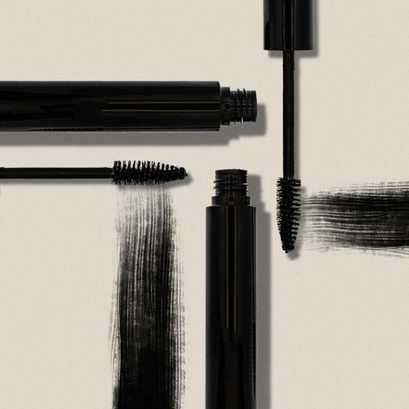 Black lengthening mascara tube and applicator brush with creamy smudge-proof vegan makeup formula — view 5