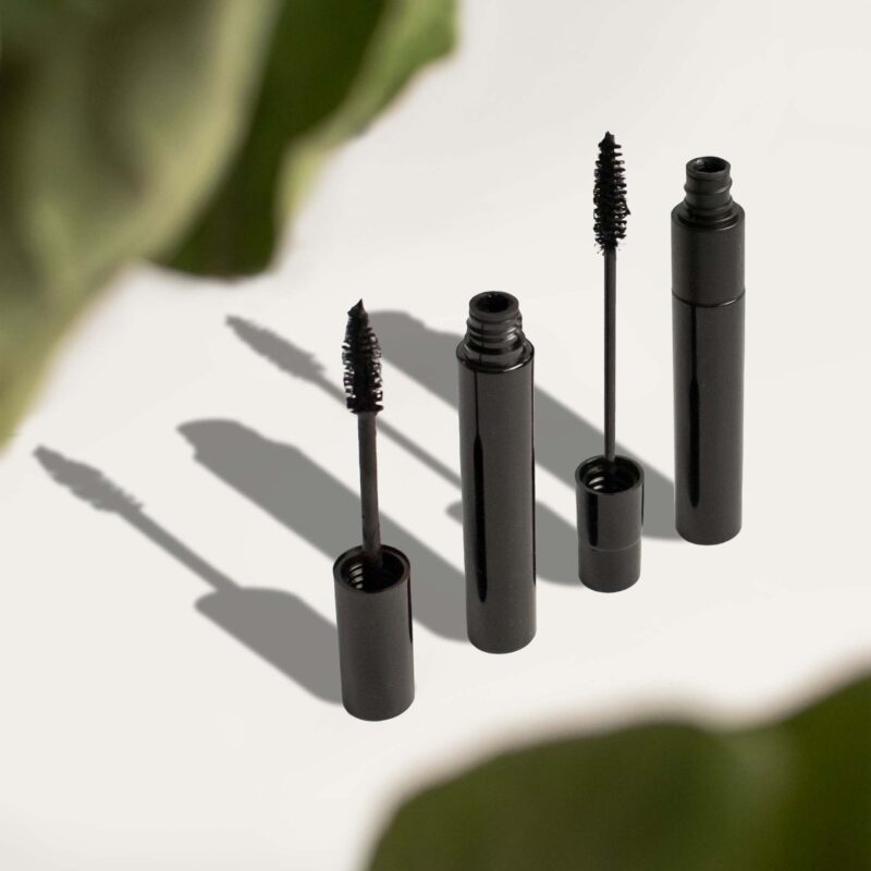 Black lengthening mascara tube and applicator brush with creamy smudge-proof vegan makeup formula — view 4