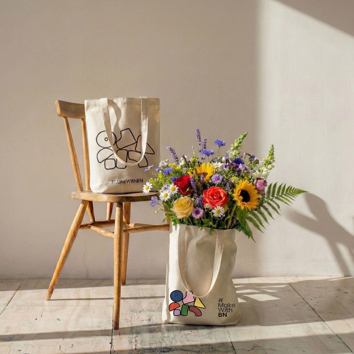 BN canvas tote bag with vibrant geometric pop-art doodles on soft creamy cotton base — view 2