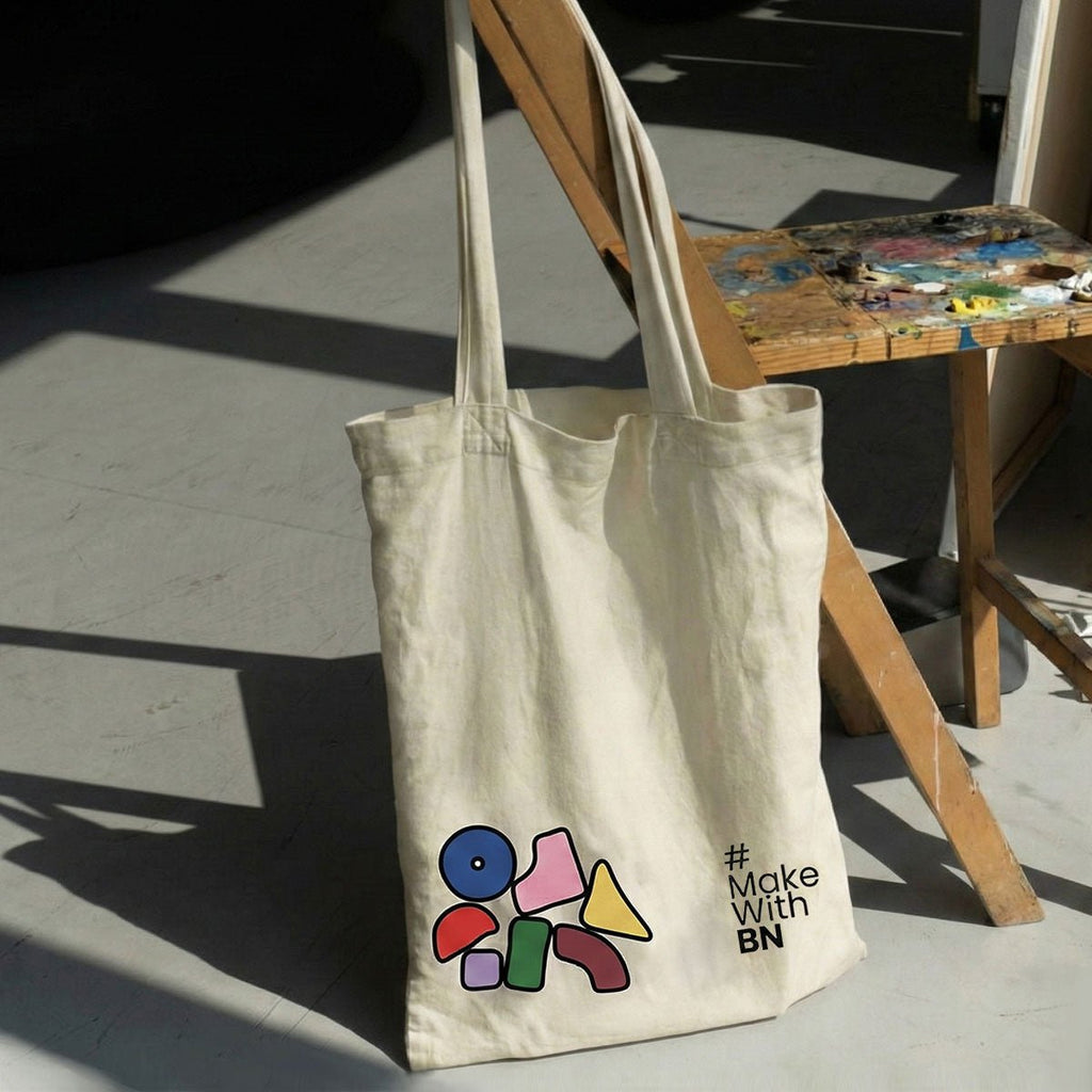BN canvas tote bag with vibrant geometric pop-art doodles on soft creamy cotton base — view 3