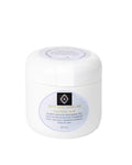 Exfoliating organic vanilla musk anti-aging body scrub in an 8 oz jar with crystal quartz.
