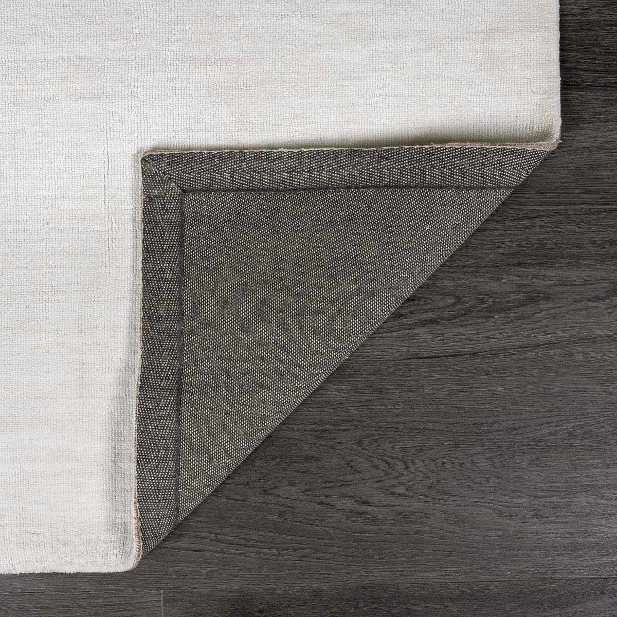 Contemporary white hand loomed low pile polyester area rug for modern living rooms and bedrooms — view 3