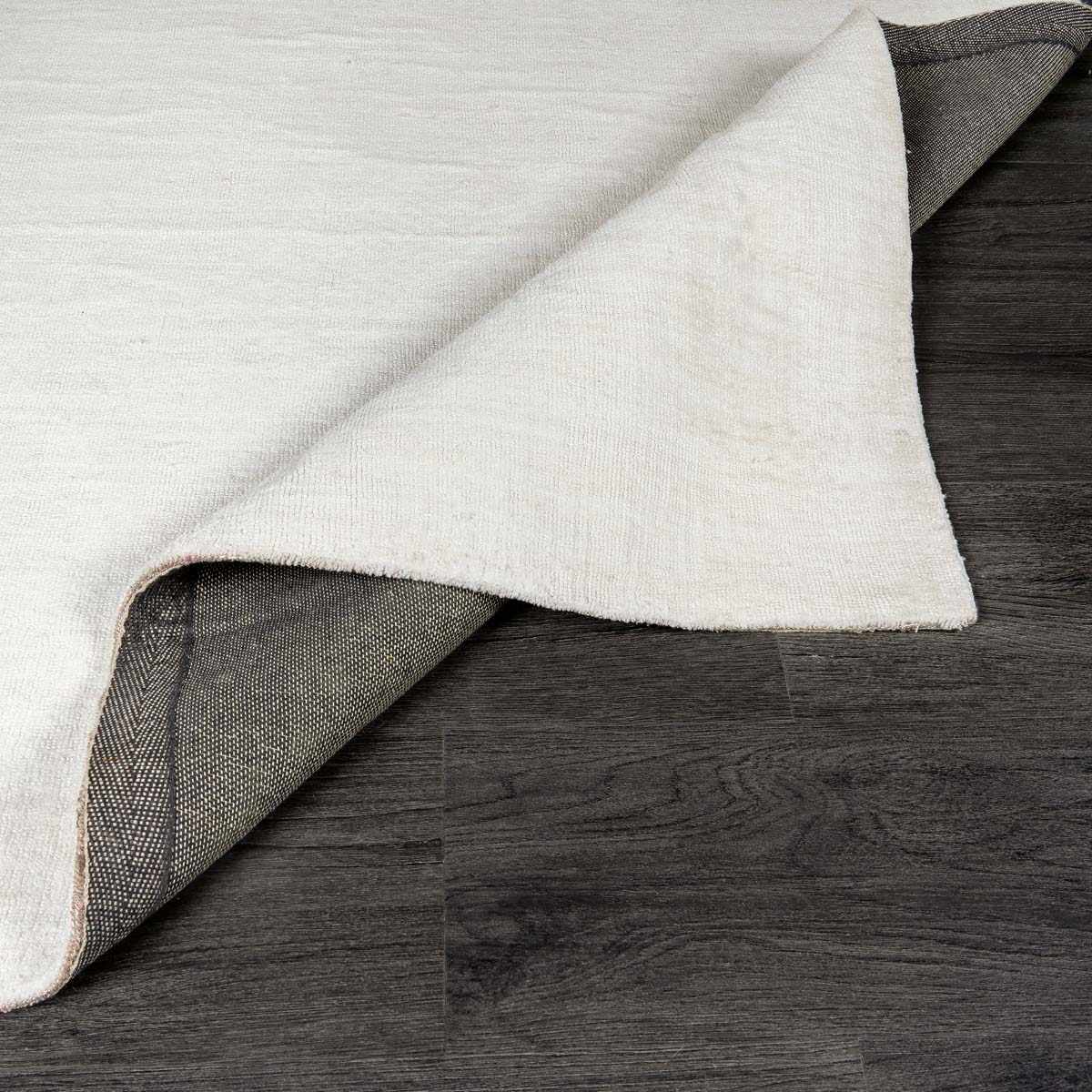 Contemporary white hand loomed low pile polyester area rug for modern living rooms and bedrooms — view 4