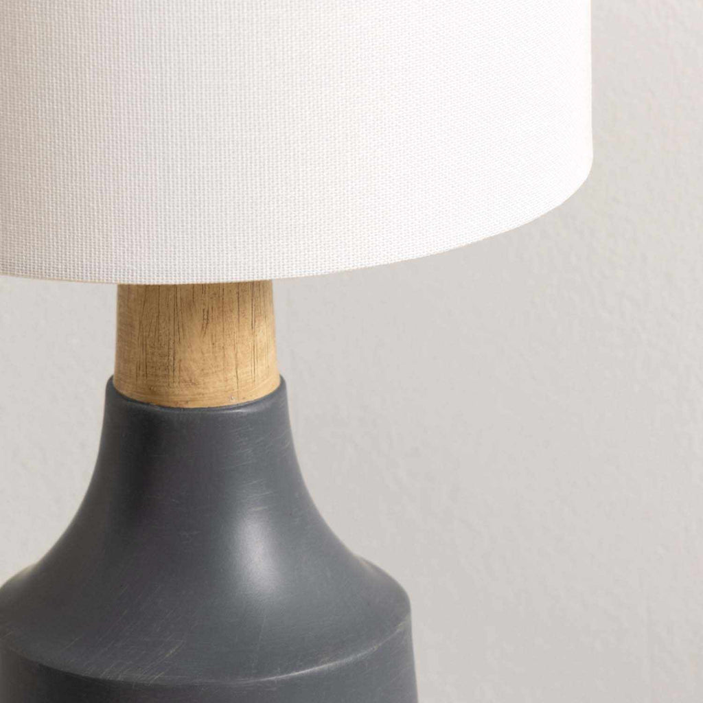 Contemporary Buharkent table lamp featuring a translucent gray resin base and white linen drum shade. — view 5