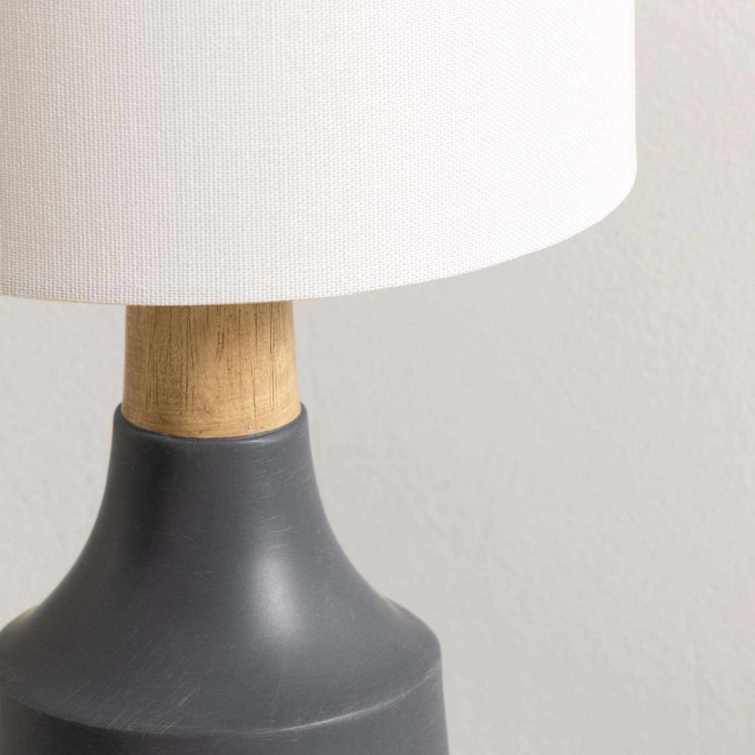 Contemporary Buharkent table lamp featuring a translucent gray resin base and white linen drum shade. — view 5