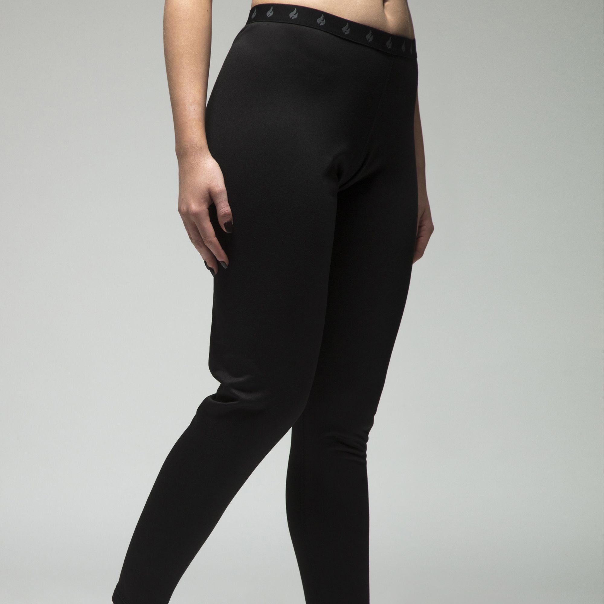 Ladies thermal base layer leggings in black, featuring a soft elastic waistband and slim supportive fit — view 3
