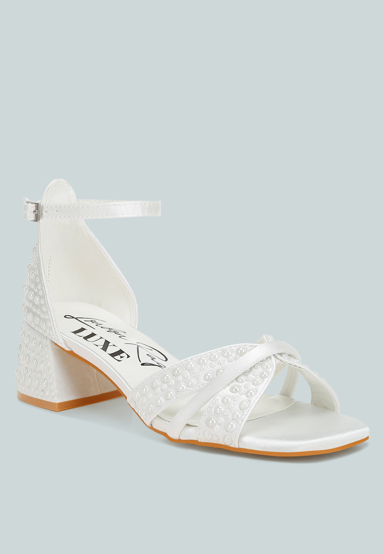 White satin low block heel sandals featuring elegant pearl embellished midfoot straps and adjustable buckles — view 2