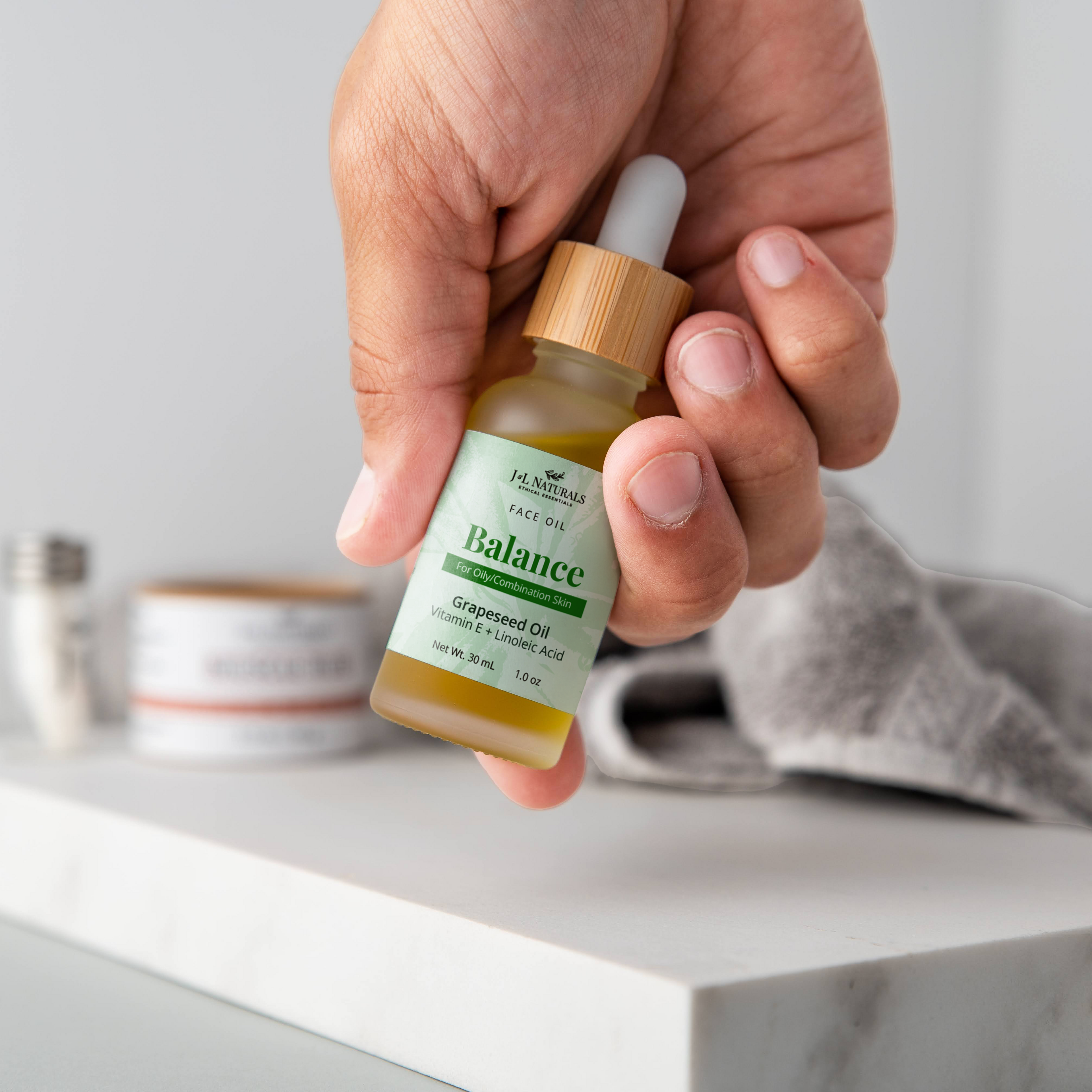 Natural plant based face oil in a glass dropper bottle for deep skincare hydration.