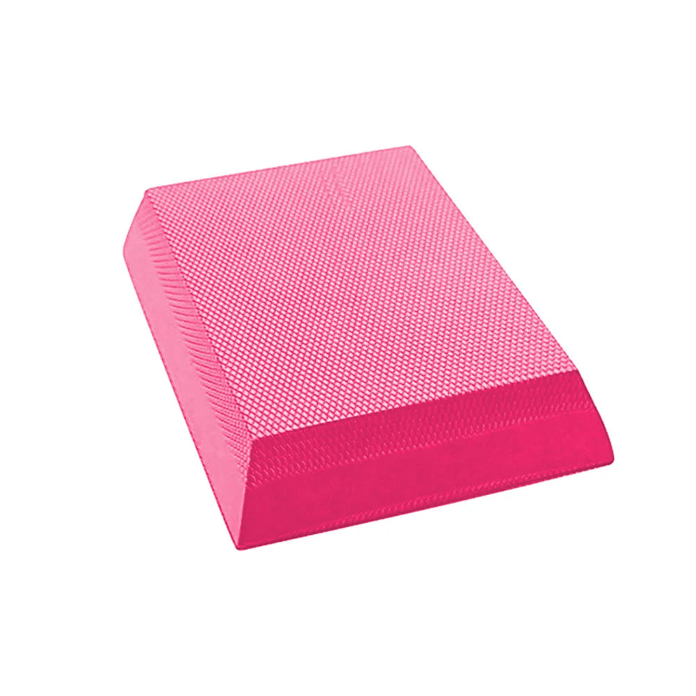Pink TPE balance pad board stability cushion for yoga Pilates and core strength training workouts