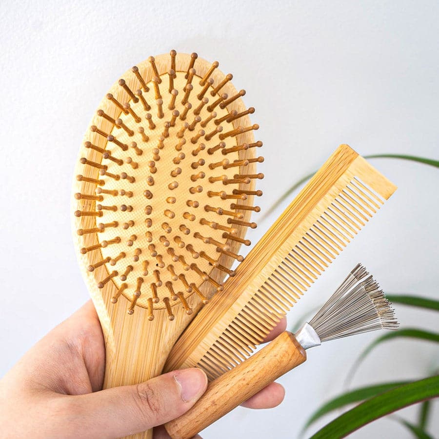 All-in-one bamboo hair brush set including paddle brush, travel brush, comb, and brush cleaner tool — view 5