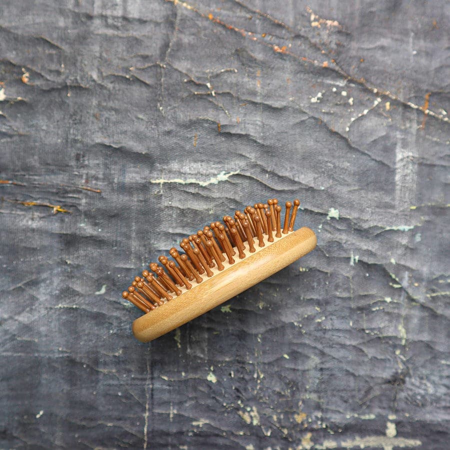 All-in-one bamboo hair brush set including paddle brush, travel brush, comb, and brush cleaner tool — view 4